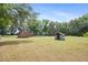 Large backyard with plenty of room to roam and two storage sheds at 19300 Sw 60Th St, Dunnellon, FL 34432
