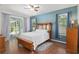 Spacious main bedroom with ensuite bathroom and direct access to screened lanai at 19395 Sw 100Th Loop, Dunnellon, FL 34432