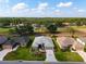 An aerial shot showcases this community's beautiful landscaping and golf course backdrop at 2008 Palo Alto Ave, The Villages, FL 32159