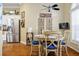 Bright dining area with a stainless fridge and lots of natural light at 2008 Palo Alto Ave, The Villages, FL 32159