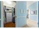 Well-organized walk-in closet with custom shelving and ample storage space at 2008 Palo Alto Ave, The Villages, FL 32159