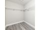 Bright, walk-in closet with built-in shelving for optimal storage at 2376 Se 40Th Street Road, Ocala, FL 34480