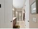 Bright bathroom boasts a glass-enclosed shower and a vanity with dark wood cabinets at 3587 Nw 55Th Cir, Ocala, FL 34482