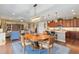Open-concept dining and living area, showcasing the kitchen's ample counter space and modern design at 3587 Nw 55Th Cir, Ocala, FL 34482
