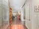 Open foyer with hardwood floors, decorative rug, and view into the spacious living areas at 3587 Nw 55Th Cir, Ocala, FL 34482