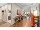Open hallway featuring hardwood floors and decorative accents leading to living spaces at 3587 Nw 55Th Cir, Ocala, FL 34482