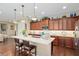 Beautiful kitchen with hardwood floors, a kitchen island, and pendant lighting at 3587 Nw 55Th Cir, Ocala, FL 34482