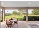 Inviting screened patio with golf course views, perfect for relaxation at 3587 Nw 55Th Cir, Ocala, FL 34482