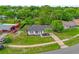 Aerial view of the home with driveway and lawn at 3807 Sw 143Rd Lane Rd, Ocala, FL 34473
