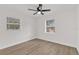 Bedroom with modern flooring and windows at 3807 Sw 143Rd Lane Rd, Ocala, FL 34473