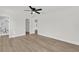Bedroom with hardwood floors, multiple closets and bathroom access at 3807 Sw 143Rd Lane Rd, Ocala, FL 34473