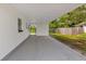 Covered carport features direct access to the backyard at 3807 Sw 143Rd Lane Rd, Ocala, FL 34473