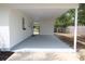 Covered patio provides shade and cover to the yard at 3807 Sw 143Rd Lane Rd, Ocala, FL 34473