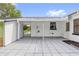 Covered patio features tiled floor and access to the backyard at 3807 Sw 143Rd Lane Rd, Ocala, FL 34473