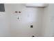 Utility room with white walls, ready for laundry hookups, and new paint at 3807 Sw 143Rd Lane Rd, Ocala, FL 34473