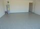 Epoxy-coated floor in a well-lit two-car garage at 4373 Ne 31St St, Ocala, FL 34470