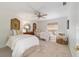 Cozy guest bedroom with two twin beds, carpet flooring, and lots of natural light at 4404 Ne 4Th St, Ocala, FL 34470
