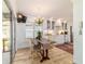Eat-in-kitchen dining nook features a chandelier and access to the outdoor space at 4404 Ne 4Th St, Ocala, FL 34470