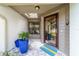 Inviting front entrance with tiled entryway, sky light and decorative plants at 4404 Ne 4Th St, Ocala, FL 34470