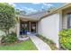 Inviting front entrance features a beautiful brick walkway and decorative plants at 4404 Ne 4Th St, Ocala, FL 34470