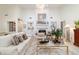Bright living room features a fireplace and built-in shelves for an open and airy feel at 4404 Ne 4Th St, Ocala, FL 34470
