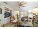 A bright home office with built-in shelving, crown molding, and a glass top desk is great for working at 4404 Ne 4Th St, Ocala, FL 34470