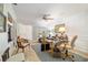 Bright home office features wood floors, crown molding, built-in shelves, and a glass top desk at 4404 Ne 4Th St, Ocala, FL 34470
