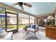 Cozy screened patio overlooking the landscaped yard, perfect for relaxation at 4404 Ne 4Th St, Ocala, FL 34470