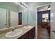 Bathroom featuring double sinks with granite countertops and plenty of light at 4721 Se 36Th St, Ocala, FL 34480