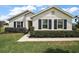 Charming single-story home showcasing crisp, white trim and dark shutters at 4721 Se 36Th St, Ocala, FL 34480