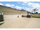 Three-car garage with concrete driveway at 4721 Se 36Th St, Ocala, FL 34480