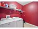 The laundry room features a Maytag washer and dryer, with storage shelves at 4721 Se 36Th St, Ocala, FL 34480