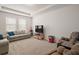 Spacious living room featuring a plush sofa and tv at 4721 Se 36Th St, Ocala, FL 34480