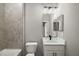Bathroom featuring vanity with quartz countertops, tile floors, and shower at 4743 Se 34Th St, Ocala, FL 34480