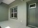 Welcoming front porch area with a classic-style front door and neutral color scheme at 4743 Se 34Th St, Ocala, FL 34480