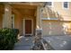 Inviting front entrance with a covered porch and a well-maintained yard at 5128 Grassy Knoll Dr, Tavares, FL 32778