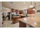 Spacious kitchen with stainless steel appliances and a center island, perfect for cooking at 5128 Grassy Knoll Dr, Tavares, FL 32778