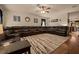 Large living room with a comfortable sectional sofa, creating an inviting atmosphere at 5128 Grassy Knoll Dr, Tavares, FL 32778