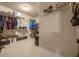 Spacious walk-in closet with generous shelving, offering plenty of room for organization and storage at 5128 Grassy Knoll Dr, Tavares, FL 32778