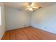 Bedroom with natural light, ceiling fan, and wood floor at 6150 Sw 103Rd Loop, Ocala, FL 34476