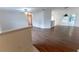 Spacious living room featuring hard surface floors, ceiling fan, and neutral walls, perfect for entertaining at 6150 Sw 103Rd Loop, Ocala, FL 34476
