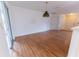 Open living room with hardwood floors, multiple entry points and a lot of natural light at 6150 Sw 103Rd Loop, Ocala, FL 34476