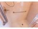 The shower features a shower head and grab bar for safety and convenience at 6150 Sw 103Rd Loop, Ocala, FL 34476