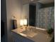 Bathroom with a modern mirror and lighting, creating a clean and functional space at 6432 Nw 64Th Ter, Ocala, FL 34482
