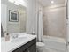 Bathroom featuring a shower and bath combination, clean lines, and neutral tile at 6816 Sw 95Th Cir, Ocala, FL 34481