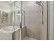 Shower and soaking tub showcasing tile surround and decorative greenery in an elegant bathroom at 6816 Sw 95Th Cir, Ocala, FL 34481
