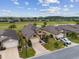 Desirable community features well-maintained homes, lush green spaces, and convenient access to amenities at 6816 Sw 95Th Cir, Ocala, FL 34481