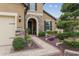 Close up of the home's stone entrance and walkway with manicured landscaping at 6816 Sw 95Th Cir, Ocala, FL 34481