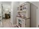 Hallway with built-in cabinet storage and entry to dining area at 6816 Sw 95Th Cir, Ocala, FL 34481