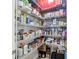 Well-stocked pantry with wire shelving, providing ample storage space for groceries and household items at 6816 Sw 95Th Cir, Ocala, FL 34481
